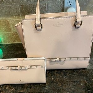 Blush pink Kate spade purse and wallet.